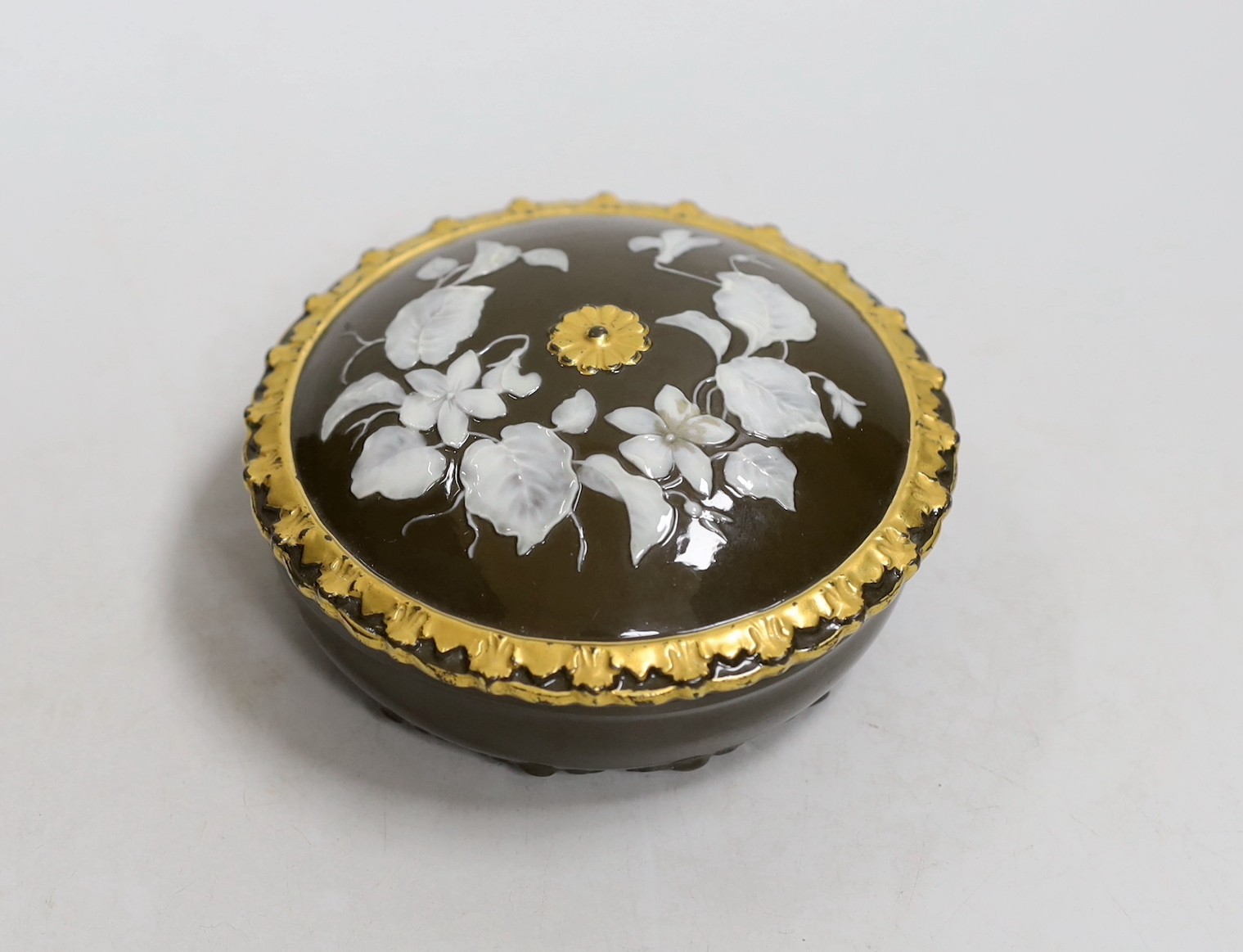 An English pate sur pate circular box and cover